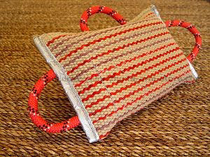 Dog bite pad made of jute with 3 handles